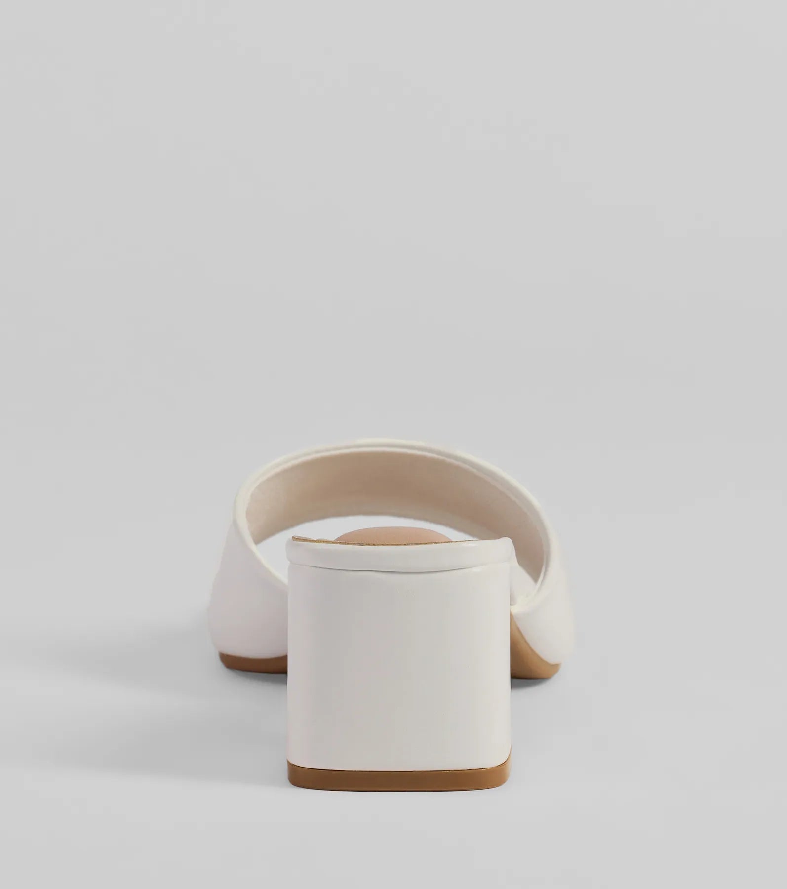 Whether you're dressing up for a romantic date or a Galentine's event, the Chic Upgrade Basic Block Heel Mules in white are the perfect accessory to elevate your Millitary Ball attire.