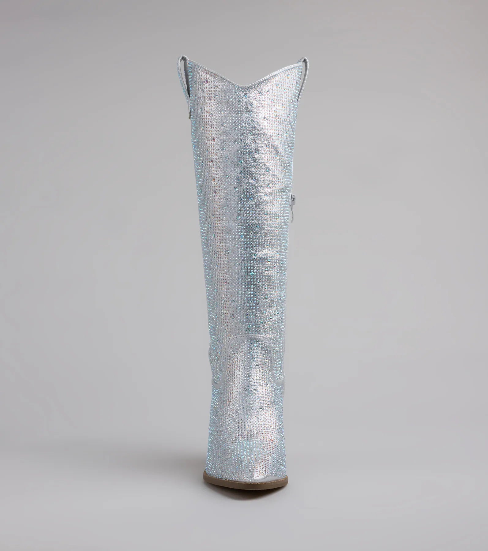 Style made simple with the Shimmer And Shine Rhinestone Cowboy Boots in silver, trendy women’s shoes that take your outfit from basic to bold in one step.