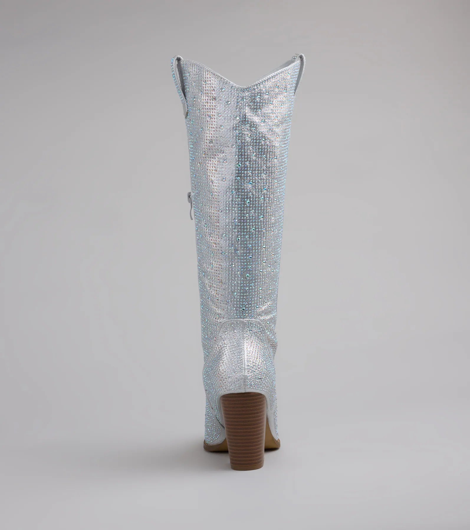 Style made simple with the Shimmer And Shine Rhinestone Cowboy Boots in silver, trendy women’s shoes that take your outfit from basic to bold in one step.