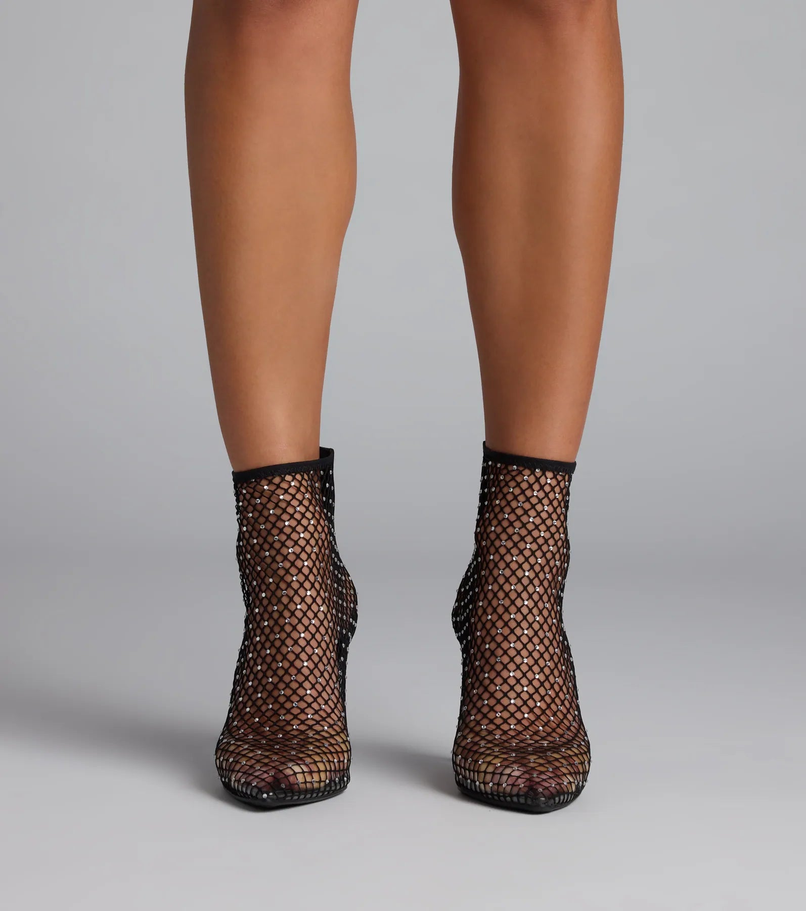 Style made simple with the Up To No Good Rhinestone Fishnet Booties in black, trendy women’s shoes that take your outfit from basic to bold in one step.