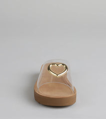 Style made simple with the Heart Eyes Only Slide Sandals in clear, trendy women’s shoes that take your outfit from basic to bold in one step.