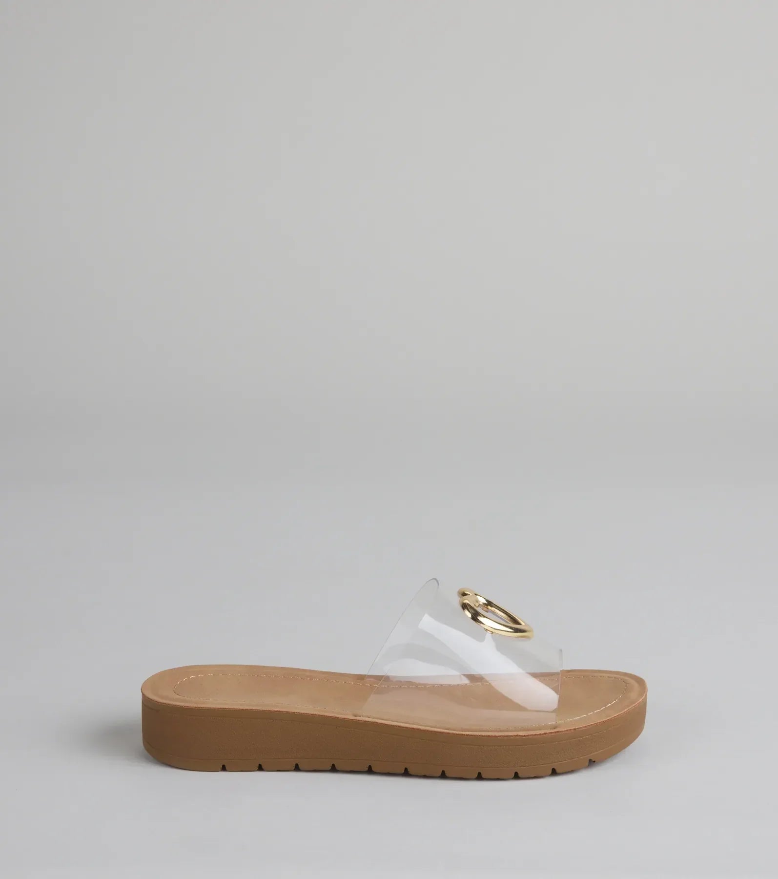 Style made simple with the Heart Eyes Only Slide Sandals in clear, trendy women’s shoes that take your outfit from basic to bold in one step.