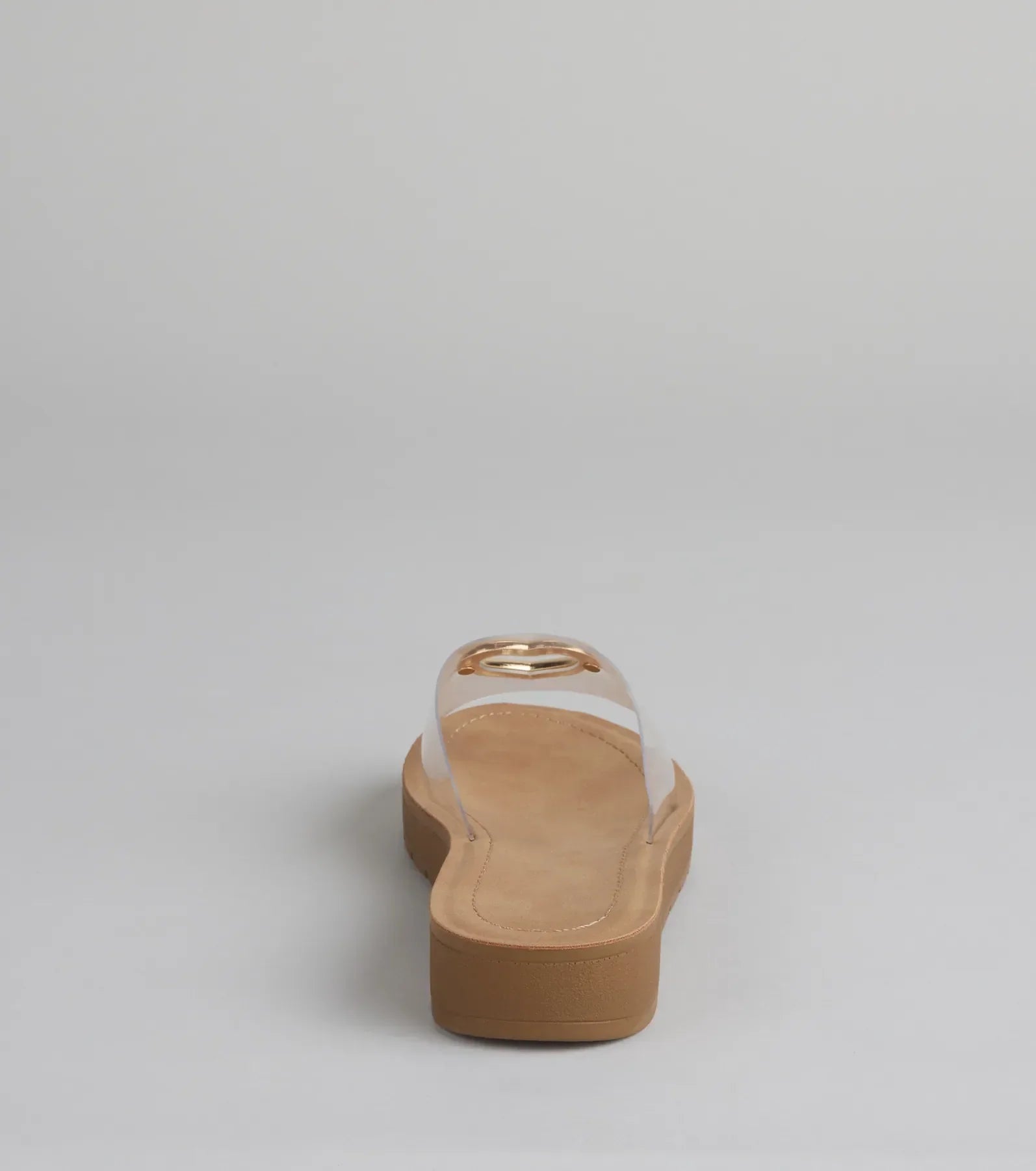 Style made simple with the Heart Eyes Only Slide Sandals in clear, trendy women’s shoes that take your outfit from basic to bold in one step.