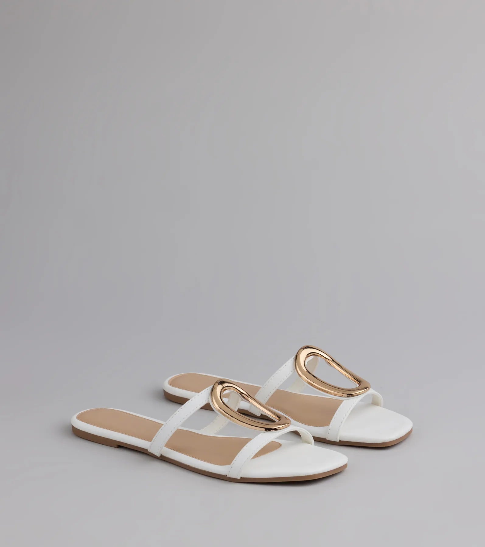 Style made simple with the Chic And Sleek Square Strappy Flat Sandals in white, trendy women’s shoes that take your outfit from basic to bold in one step.