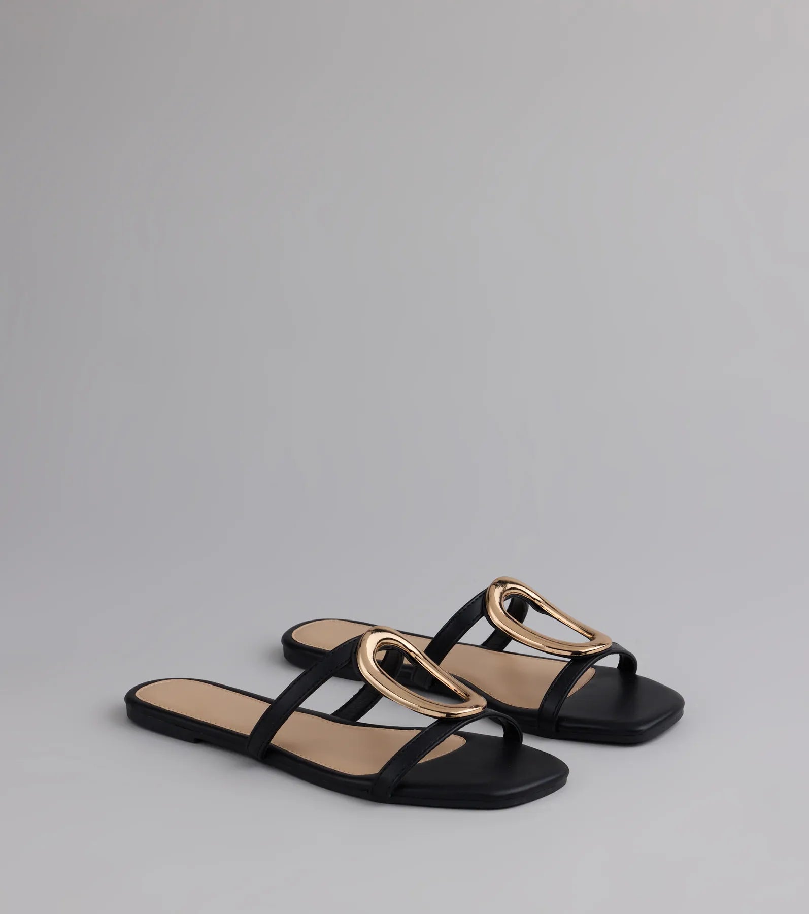 Style made simple with the Chic And Sleek Square Strappy Flat Sandals in black, trendy women’s shoes that take your outfit from basic to bold in one step.