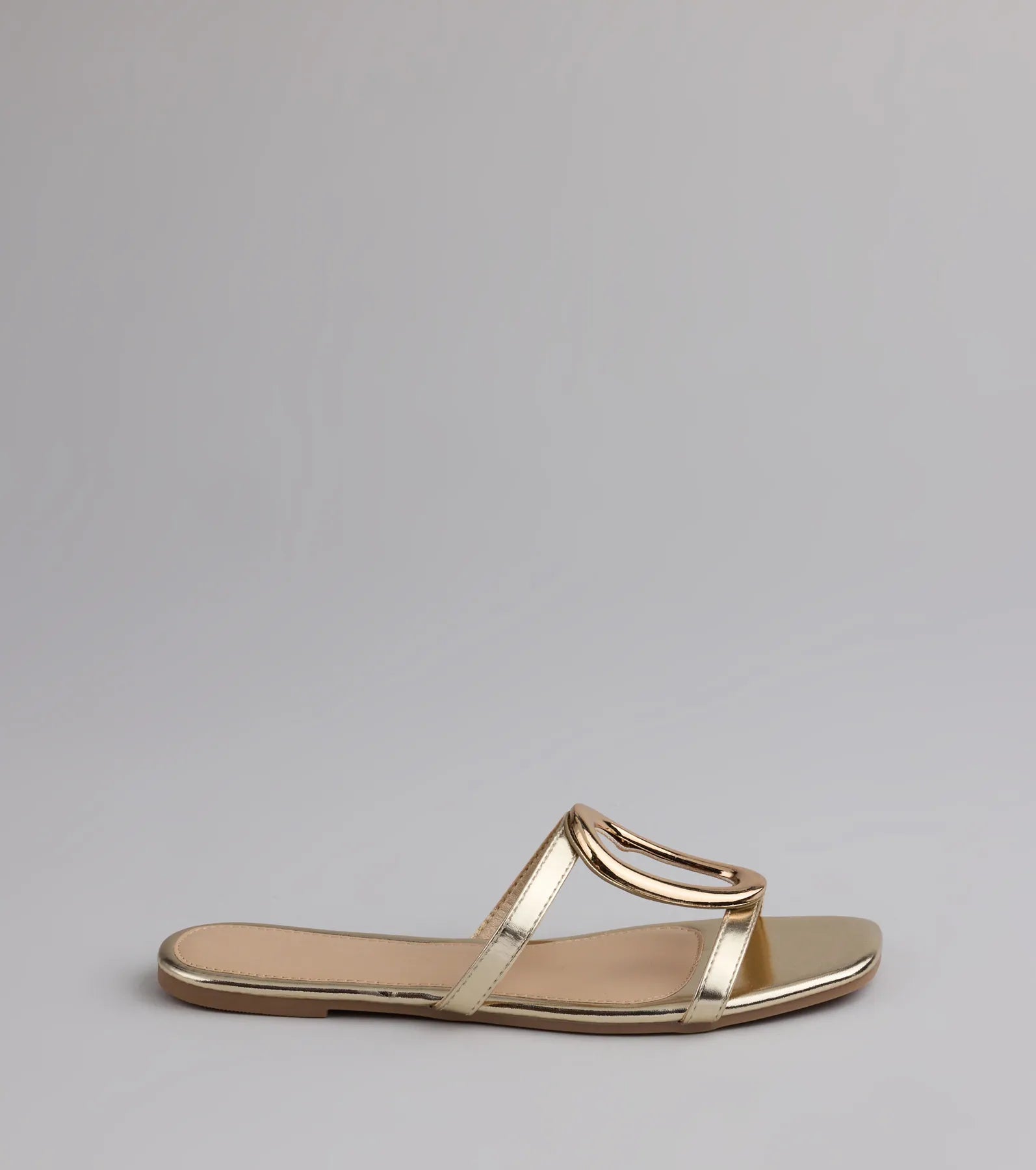 Style made simple with the Chic And Sleek Square Strappy Flat Sandals in gold, trendy women’s shoes that take your outfit from basic to bold in one step.