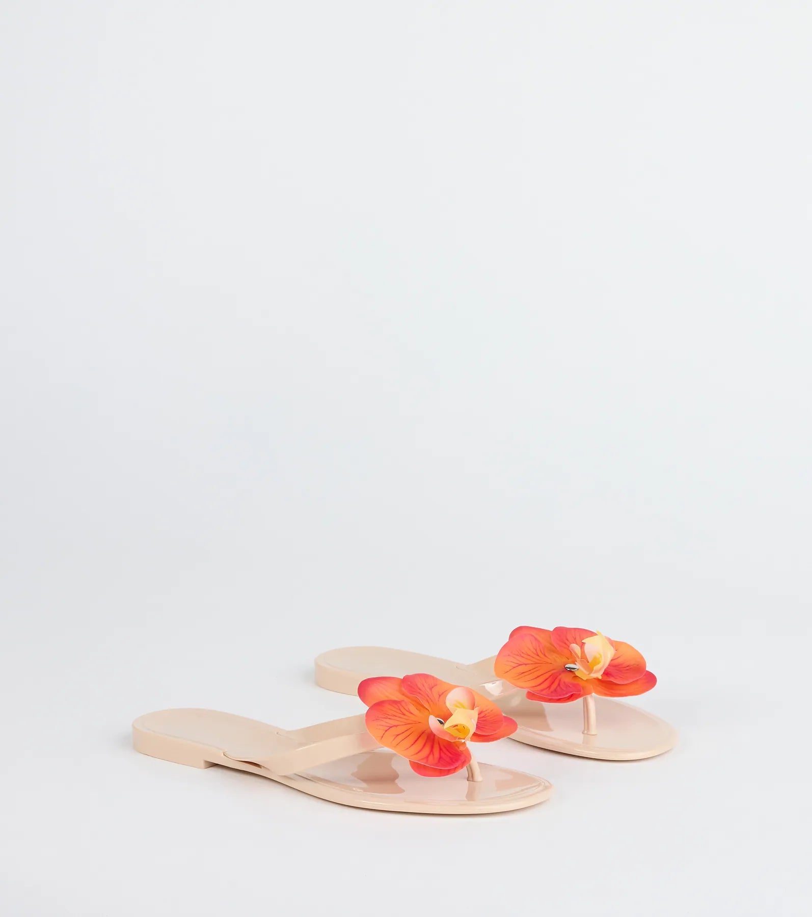 Style made simple with the On Vacay Flower Strap Jelly Sandals in nude, trendy women’s shoes that take your outfit from basic to bold in one step.