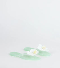 Style made simple with the On Vacay Flower Strap Jelly Sandals in mint green, trendy women’s shoes that take your outfit from basic to bold in one step.