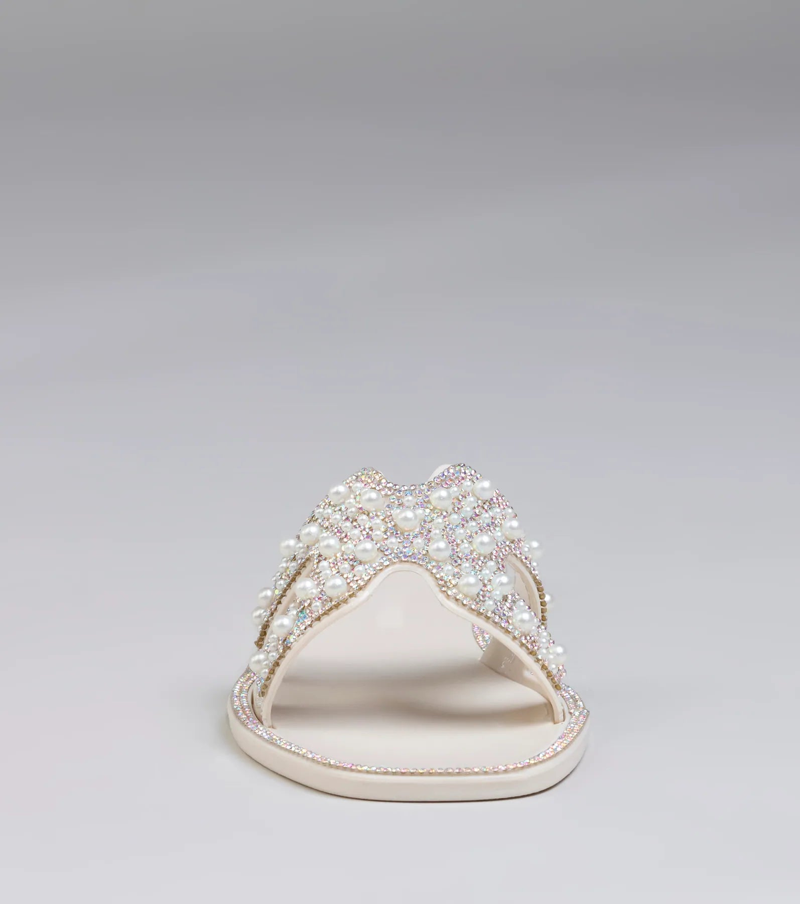 Style made simple with the Pop Of Luxe Sparkle Faux Pearl Rhinestone Sandals in ivory, trendy women’s shoes that take your outfit from basic to bold in one step.