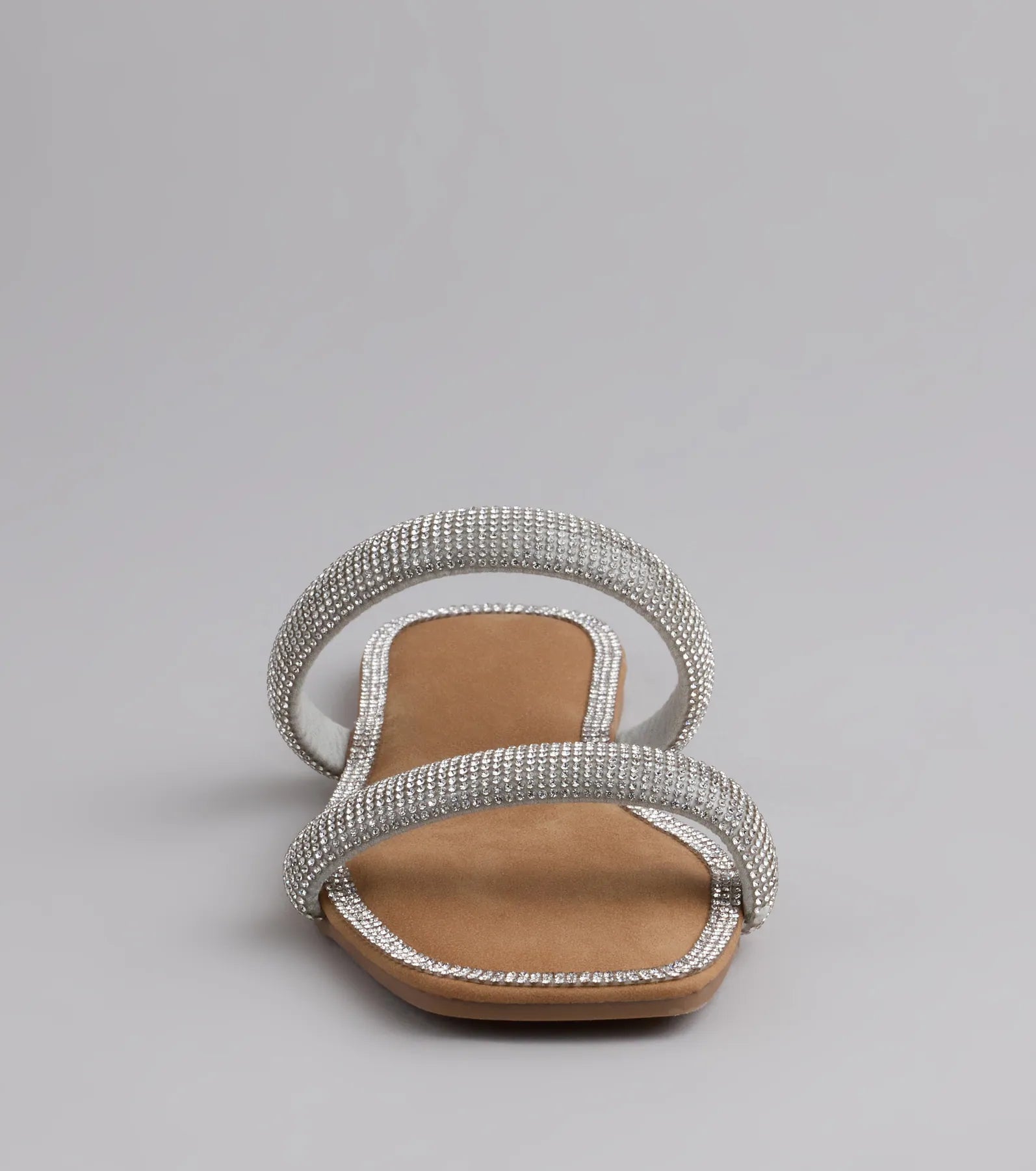 Style made simple with the Step Into Glam Rhinestone Sandals in silver, trendy women’s shoes that take your outfit from basic to bold in one step.