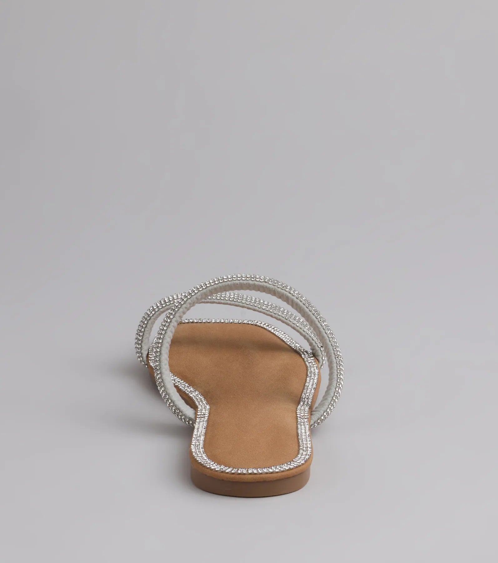 Style made simple with the Step Into Glam Rhinestone Sandals in silver, trendy women’s shoes that take your outfit from basic to bold in one step.