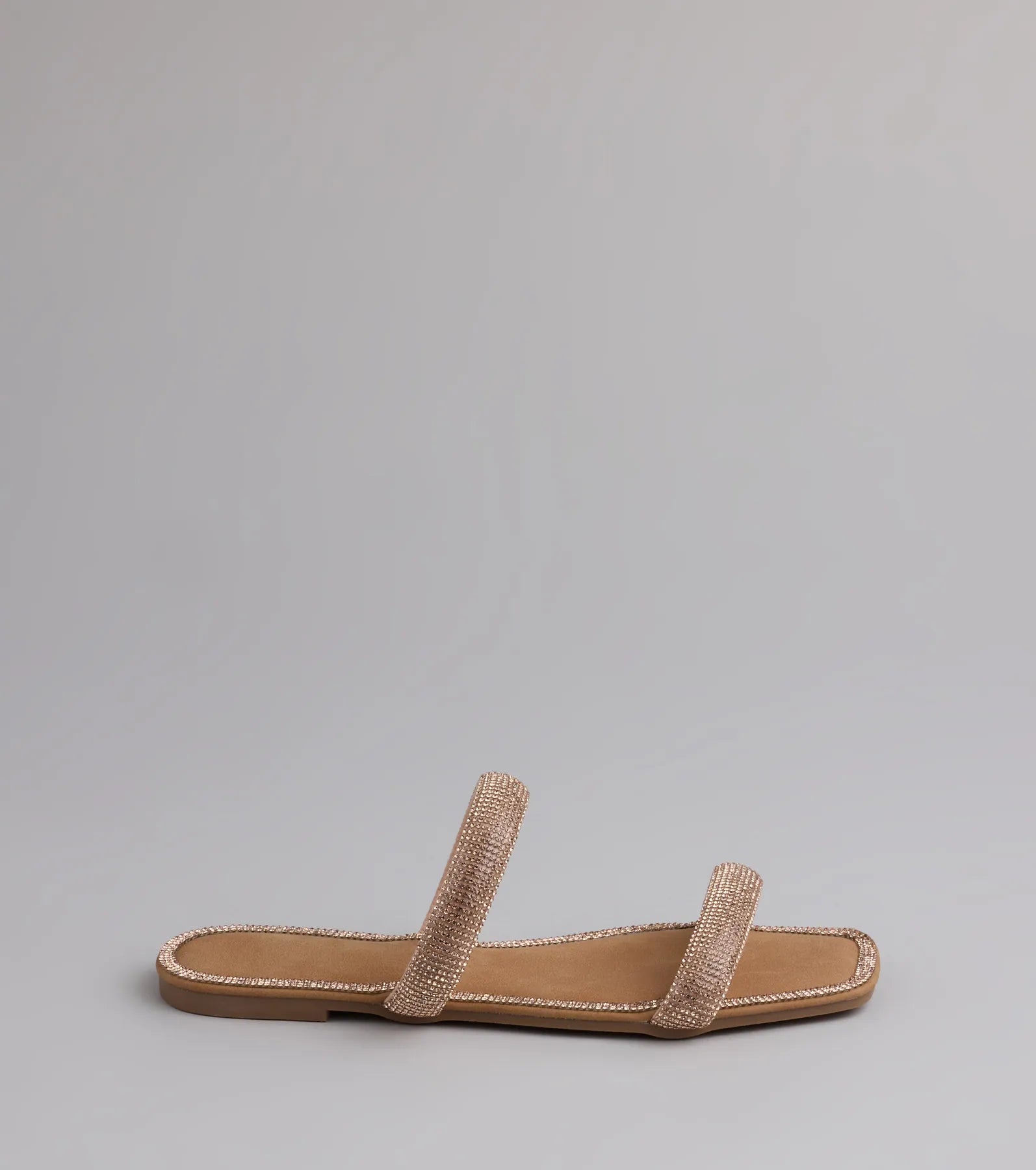 Style made simple with the Step Into Glam Rhinestone Sandals in rose gold, trendy women’s shoes that take your outfit from basic to bold in one step.