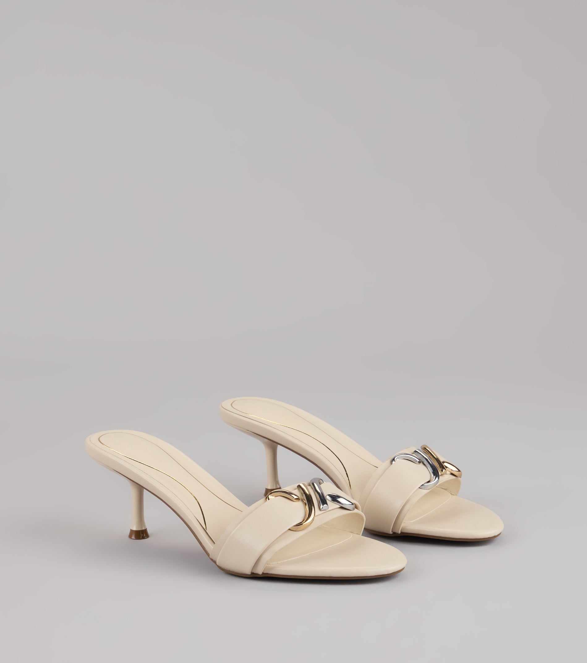 Style made simple with the Double Take Hardware Kitten Mules, trendy women’s shoes that take your outfit from basic to bold in one step.