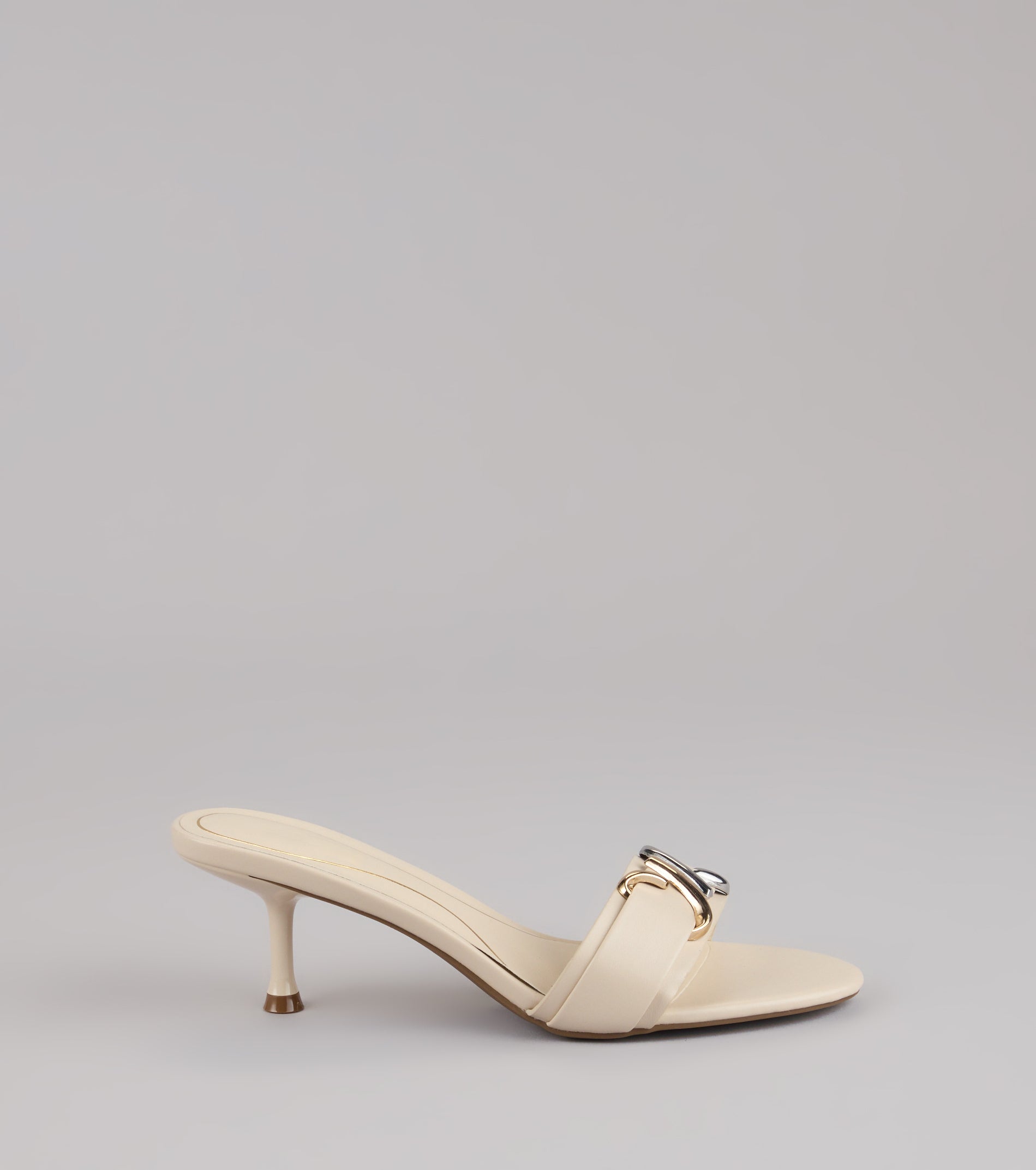 This piece brings trend-right energy to the Double Take Hardware Kitten Mules, perfect for fall outfits that stand out.