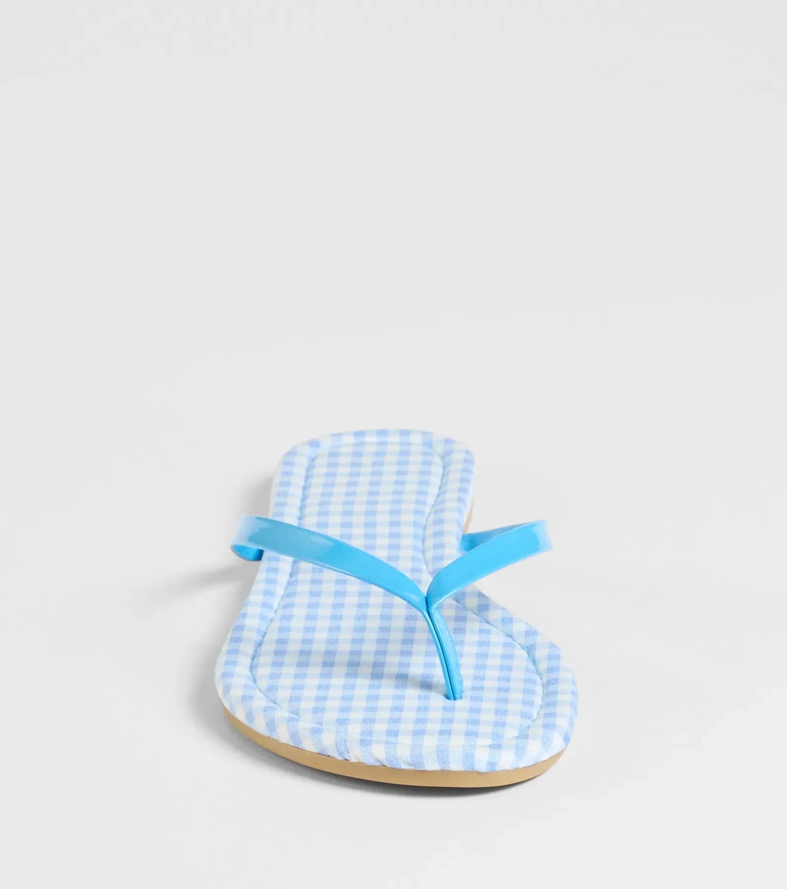 Style made simple with the Cutie Vibe Gingham Print Thong Strap Sandals in blue, trendy women’s shoes that take your outfit from basic to bold in one step.