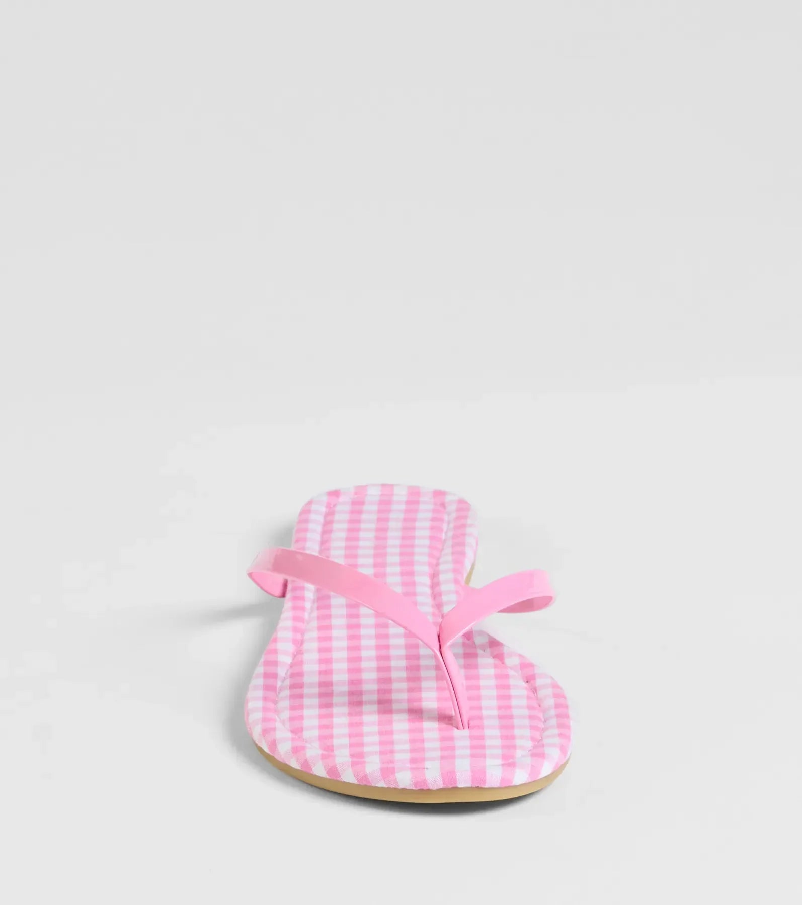 Style made simple with the Cutie Vibe Gingham Print Thong Strap Sandals in pink, trendy women’s shoes that take your outfit from basic to bold in one step.