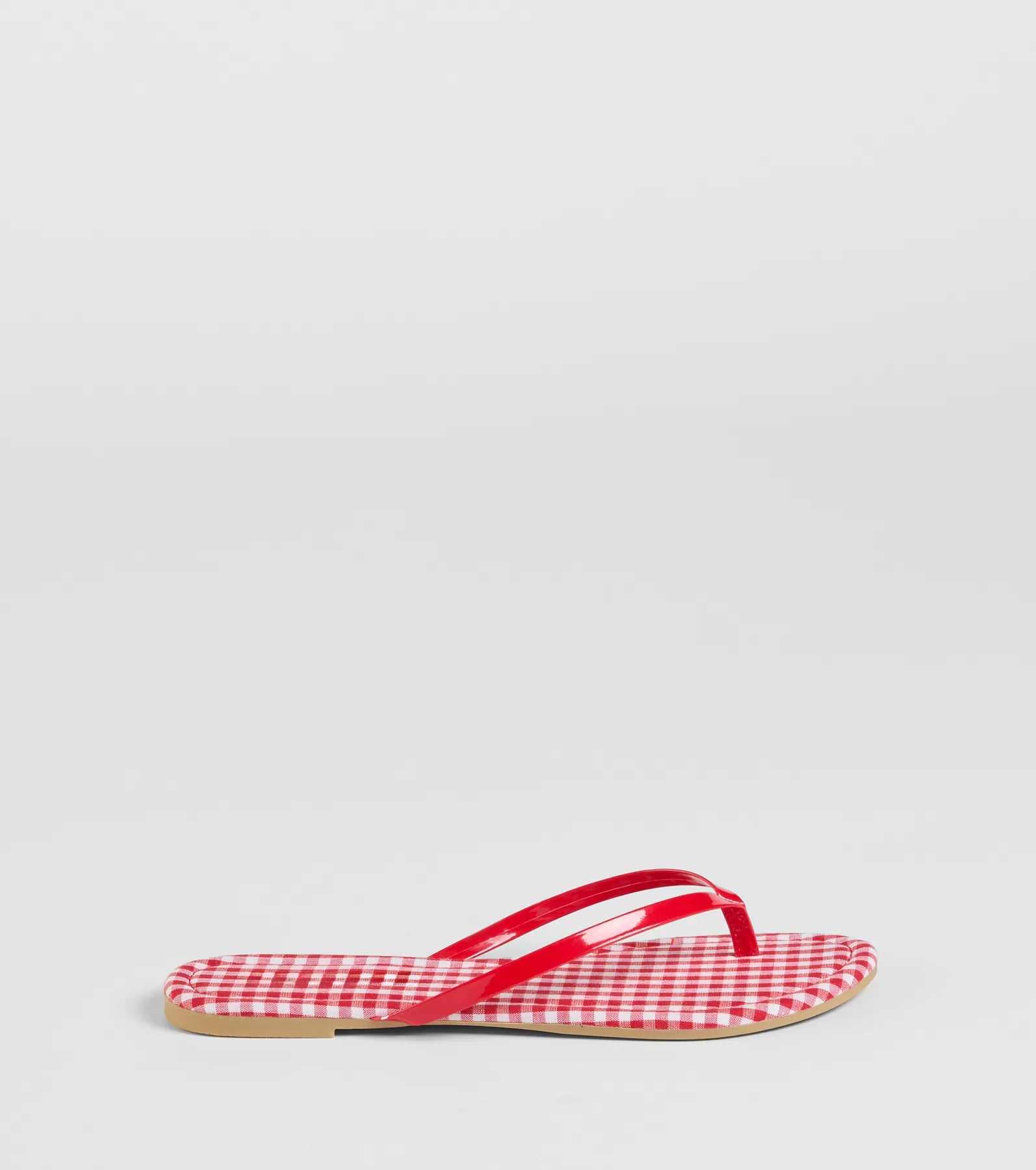Elevate warm-weather looks with Cutie Vibe Gingham Print Thong Strap Sandals in red, a pair of trendy sandals bringing chic, modern flair to every step.