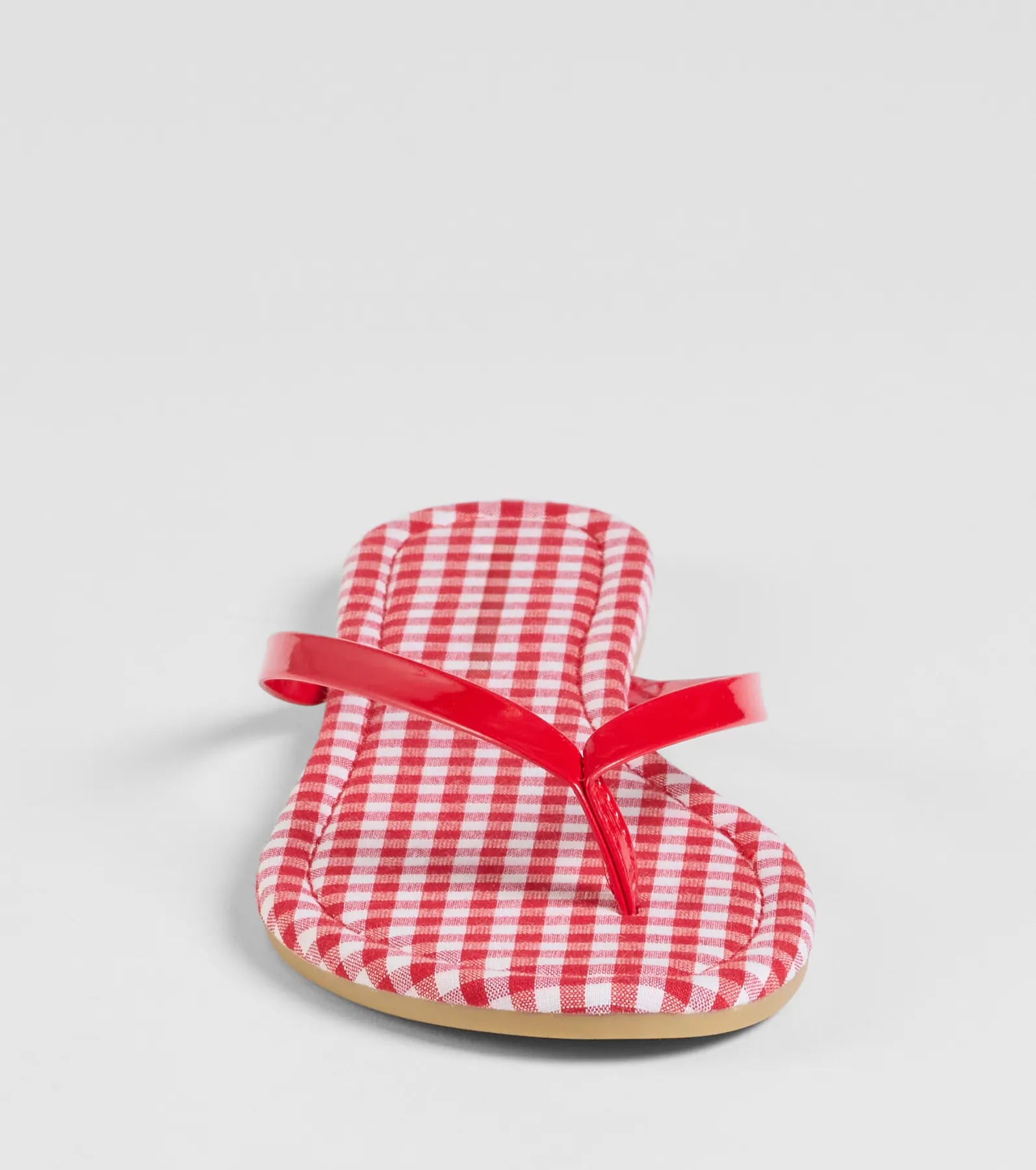 Style made simple with the Cutie Vibe Gingham Print Thong Strap Sandals in red, trendy women’s shoes that take your outfit from basic to bold in one step.