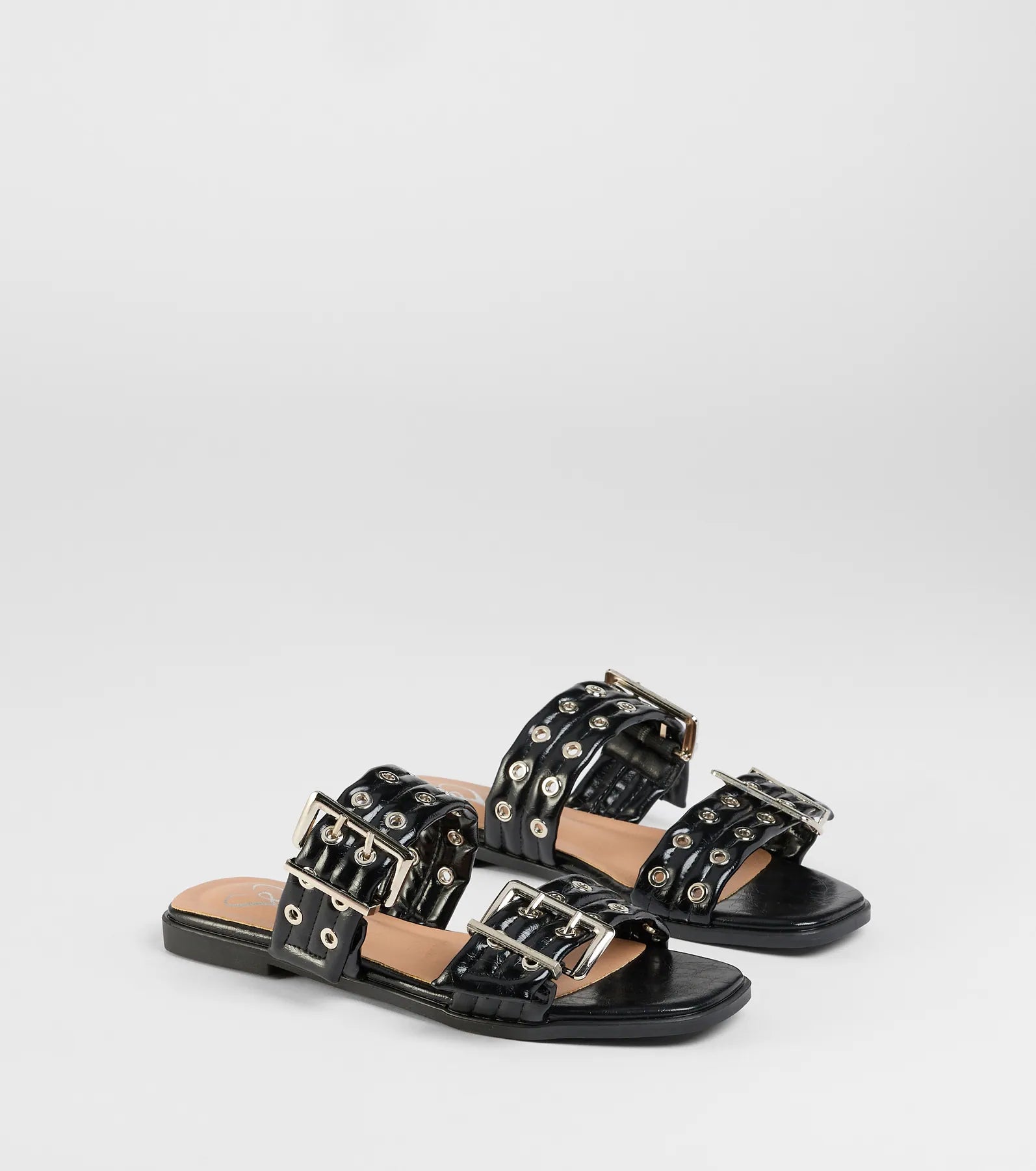 Style made simple with the Get It Girl Buckle Strappy Sandals in black, trendy women’s shoes that take your outfit from basic to bold in one step.