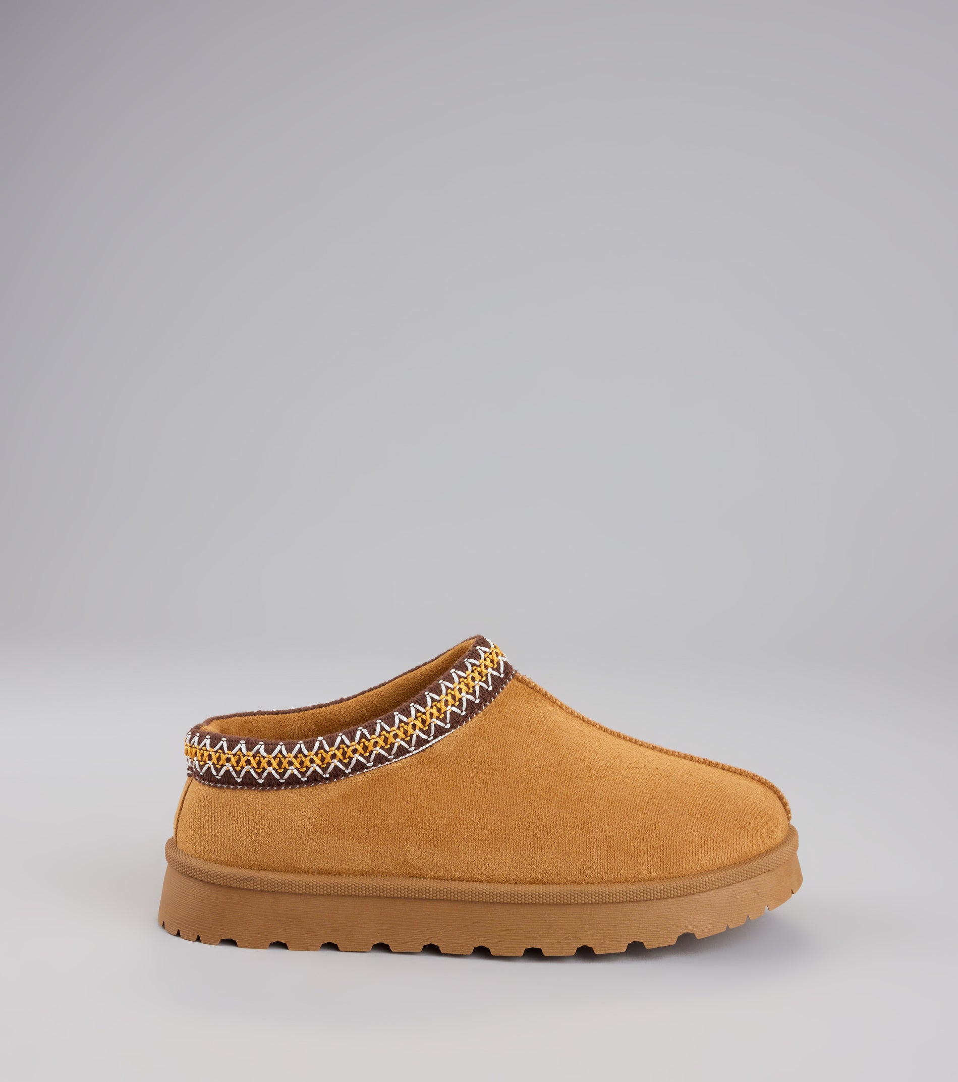 Style made simple with the Cozy Status Faux Suede Platform Slippers in tan, trendy women’s shoes that take your outfit from basic to bold in one step.