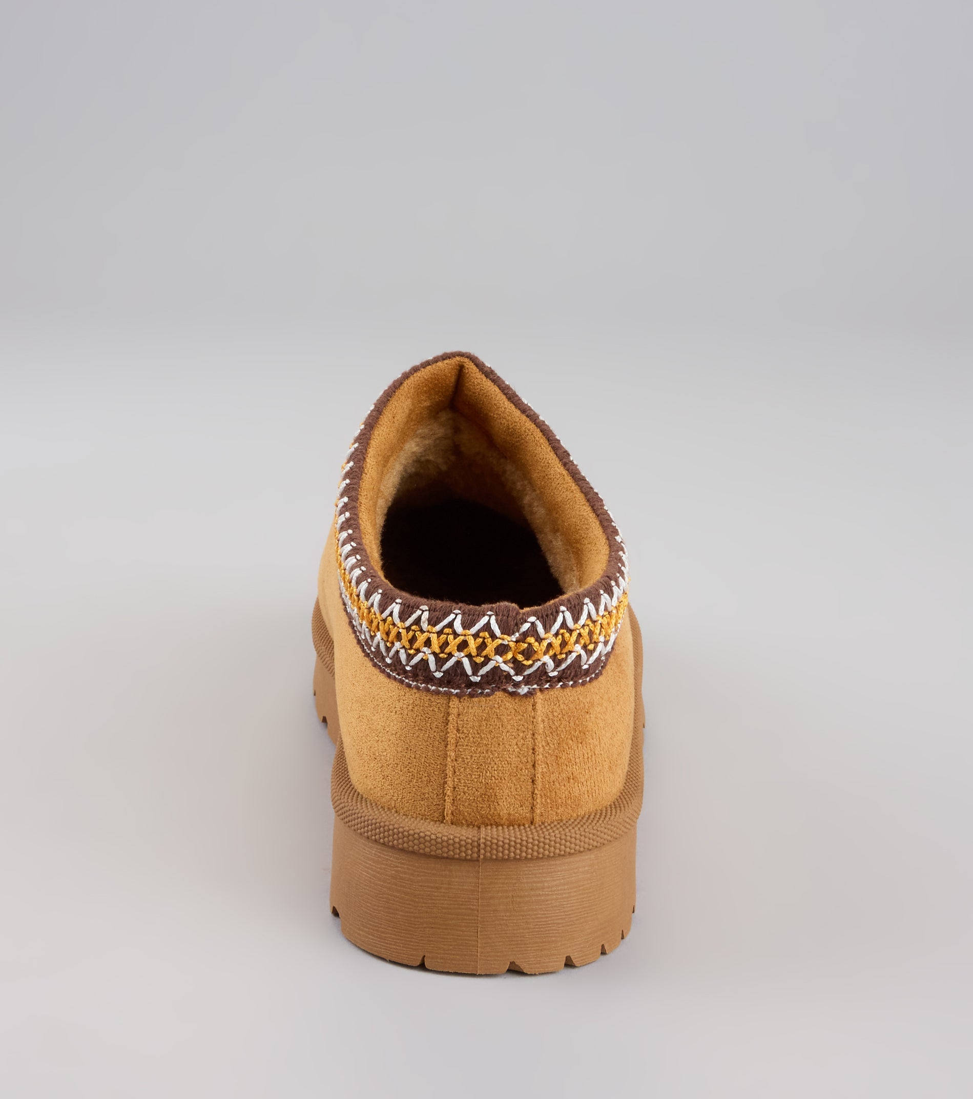 This tan piece brings trend-right energy to the Cozy Status Faux Suede Platform Slippers, perfect for fall outfits that stand out.