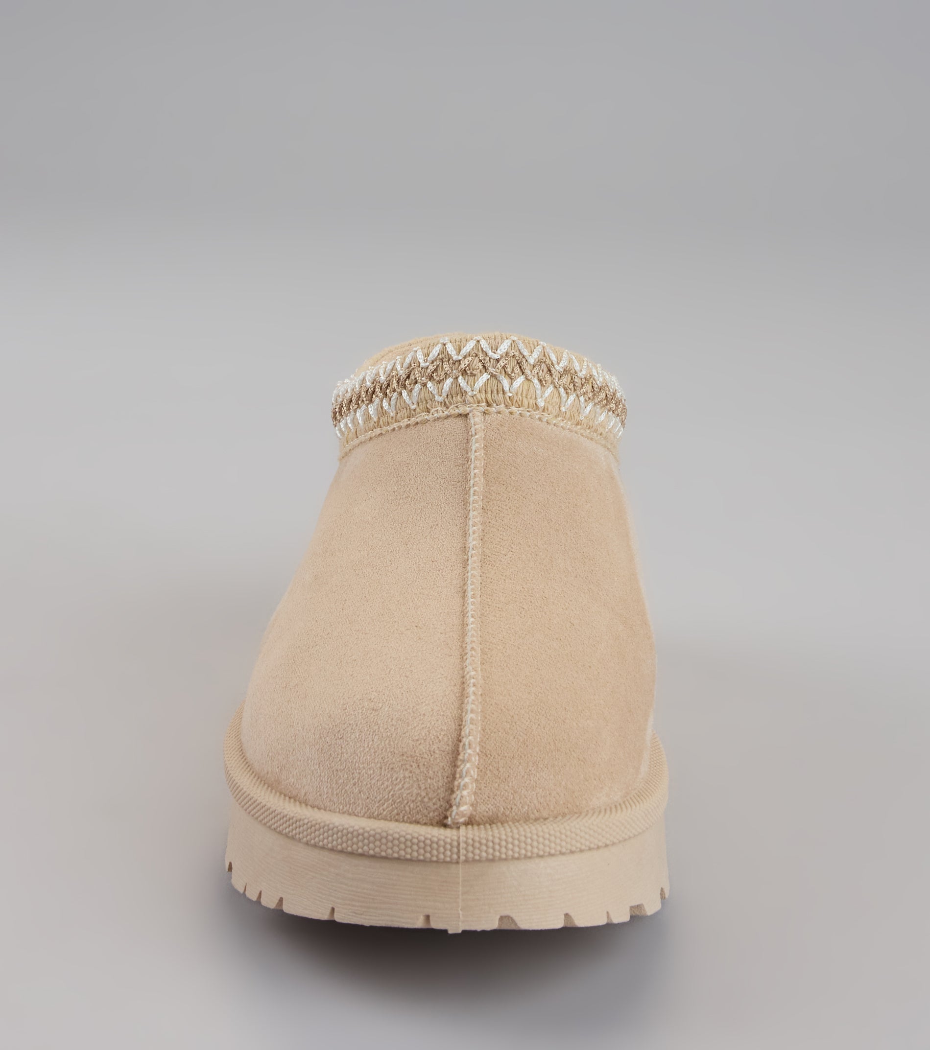 This beige piece brings trend-right energy to the Cozy Status Faux Suede Platform Slippers, perfect for fall outfits that stand out.