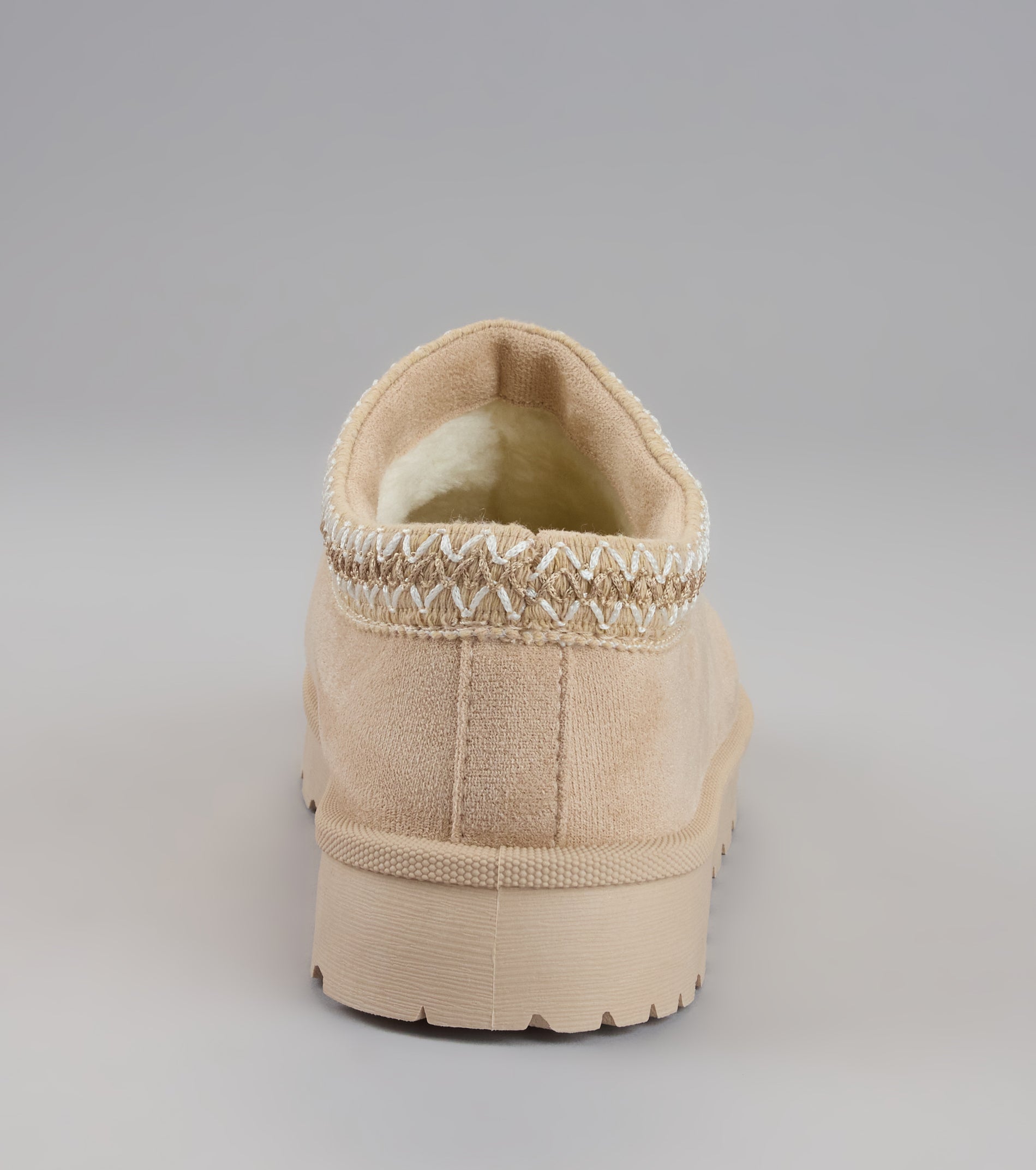 This beige piece brings trend-right energy to the Cozy Status Faux Suede Platform Slippers, perfect for fall outfits that stand out.