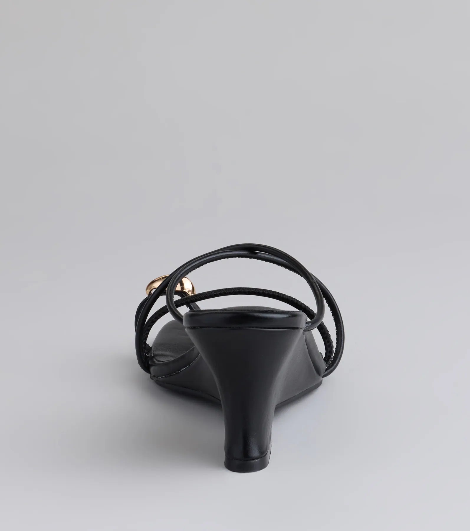 Elevate warm-weather looks with Refined And Classy Toe Ring Strappy Wedges in black, a pair of trendy sandals bringing chic, modern flair to every step.